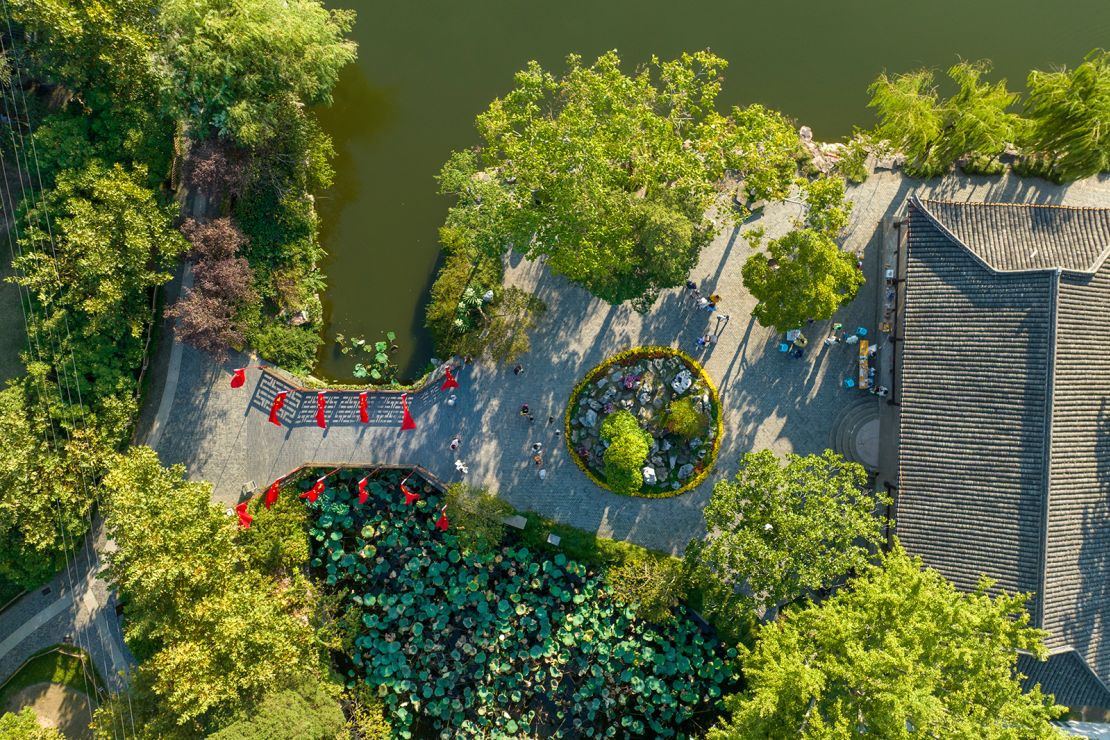 An aerial photo taken on Oct 3, 2022 shows tourists sightseeing in a historic and cultural district in Rugao city, Jiangsu province, China.