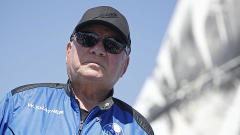 Star Trek actor William Shatner speaks to the news media after his flight with three others in a capsule powered by Blue Origin's reusable rocket engine New Shepard  on a landing pad  near Van Horn, Texas, on October 13, 2021. 