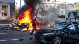 Cars burn after Russian military strike, as Russia's invasion of Ukraine continues, in central Kyiv, Ukraine October 10, 2022.