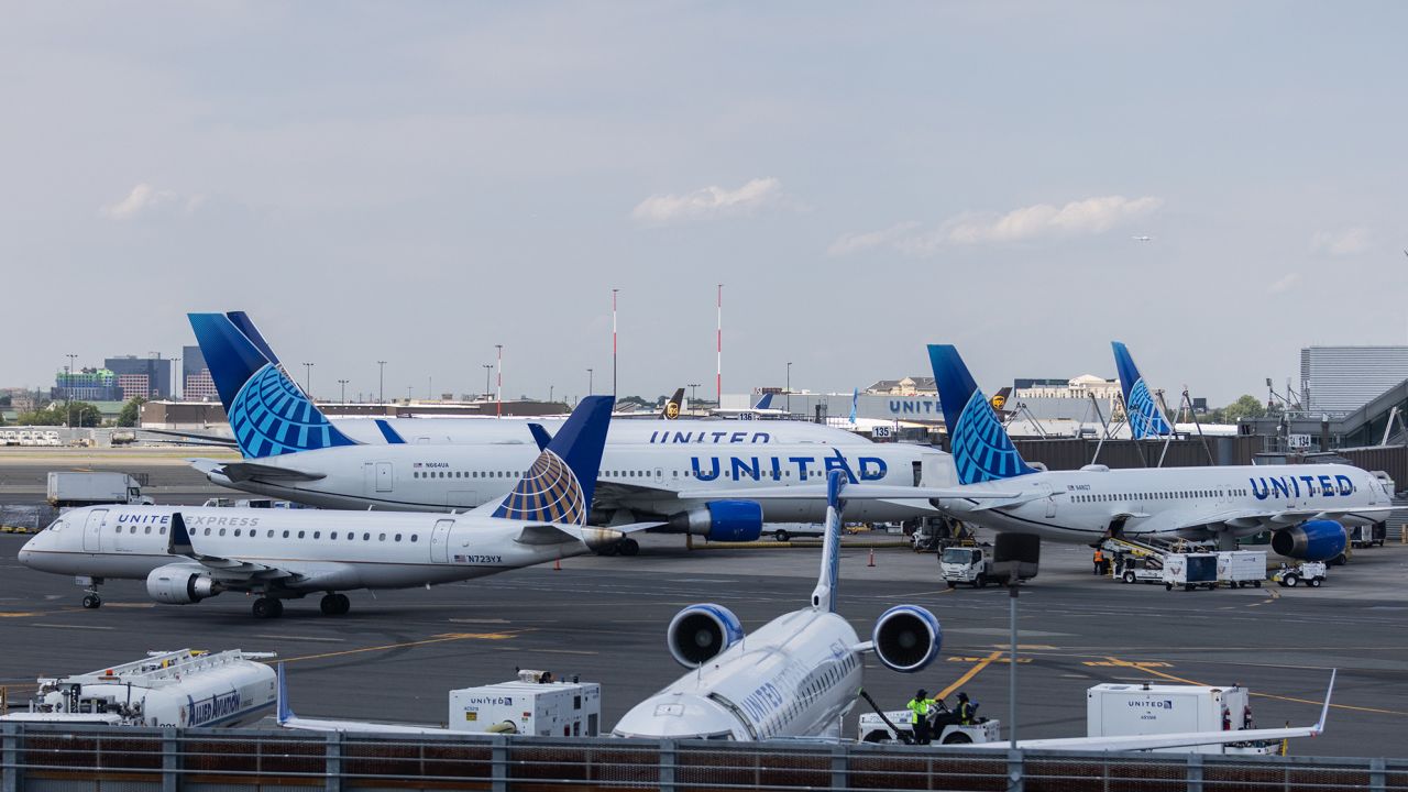 NEWARK, NJ - JULY 01: United Airlines aircraft are seen at Newark Liberty International Airport (EWR) on July 1, 2022 in Newark, New Jersey. Hundreds of flights were canceled across the US ahead of July Fourth weekend. (Photo by Jeenah Moon/Getty Images)