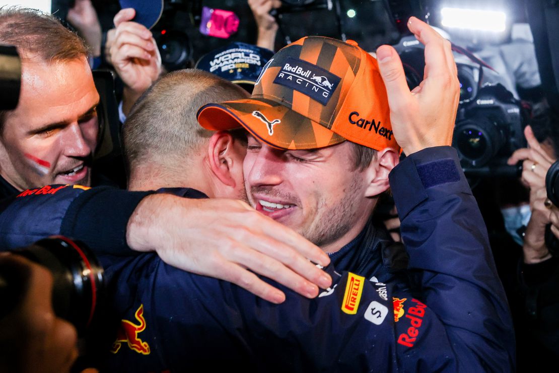 Max Verstappen celebrates becoming F1 world champion with his race engineer, Gianpiero Lambiase.