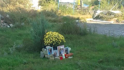 A memorial to those killed at 2 Pershotravneva is pictured on September 30. 