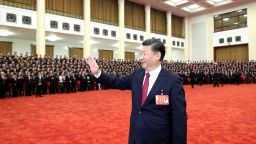 Chinese leader Xi Jinping waves to participants at Beijing's Great Hall of the People during the 19th Communist Party National Congress in 2017. 