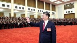 Chinese leader Xi Jinping waves to participants at Beijing's Great Hall of the People during the 19th Communist Party National Congress in 2017.