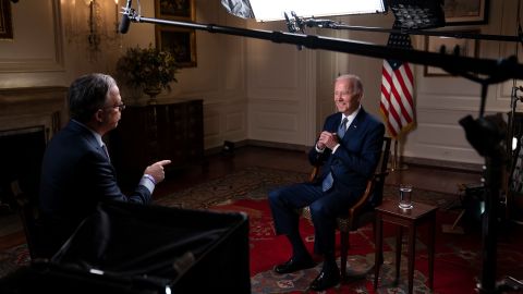 President Joe Biden speaks with CNN's Jake Tapper during an interview Tuesday in the White House Map Room.