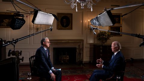 President Joe Biden speaks with CNN's Jake Tapper during an interview in the Map Room of the White House in Washington, D.C., U.S., October 11, 2022. Photo by Sarah Silbiger for CNN