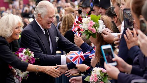 Charles and Camilla, Queen Consort greet wellwishers as they arrive at Hillsborough Castle in Belfast on September 13.