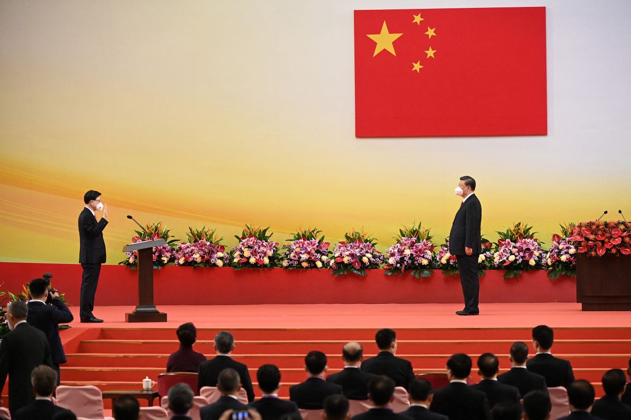 Xi looks on as Hong Kong's incoming Chief Executive John Lee is sworn in as the city's new leader in July 2022.