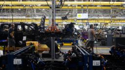 Workers on the Ford F-150 Lightning production line at the Ford Motor Co. Rouge Electric Vehicle Center (REVC) in Dearborn, Michigan, US, on Thursday, Sept. 8, 2022. 