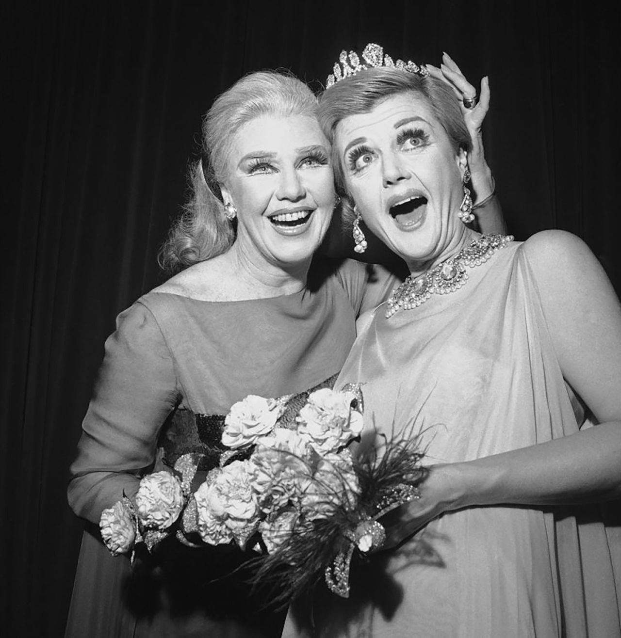 Lansbury, right, attends a charity ball with Ginger Rogers in 1966.