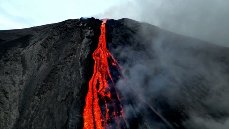 Stunning footage shows volcano's lava stretching to the sea