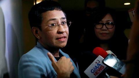 Maria Ressa, CEO of online news platform Rappler, speaks to the media after being served an arrest warrant in Pasig City, Philippines, in February 2019.