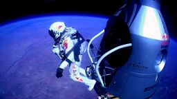 This picture shows pilot Felix Baumgartner of Austria jumping out of the capsule during the final manned flight for Red Bull Stratos on October 14, 2012. The Austrian daredevil became the first man to break the sound barrier in a record-shattering freefall jump from the edge of space, organizers said. The 43-year-old leapt from a capsule more than 24 miles (39 kilometers) above the Earth, reaching a speed of 706 miles per hour (1,135 km/h) before opening his red and white parachute and floating down to the New Mexico desert.