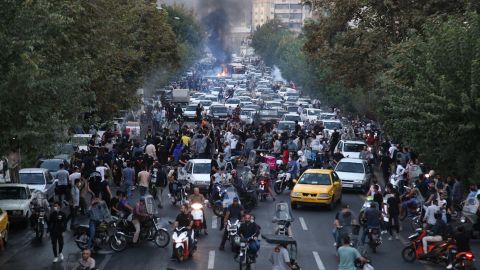 A picture taken by AFP outside Iran on September 21, 2022 shows Iranian demonstrators on the streets of Tehran during a protest for Mahsa Amini, days after she died in police custody.