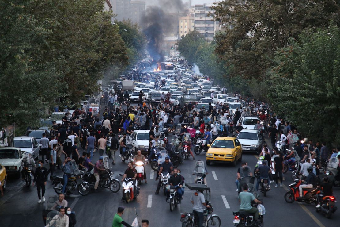 Iranian demonstrators take to the streets of the capital Tehran during a protest for Mahsa Amini, days after she died in police custody, on September 21.  