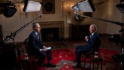 President Joe Biden speaks with CNN's Jake Tapper during an interview in the Map Room of the White House in Washington, D.C., U.S., October 11, 2022. 