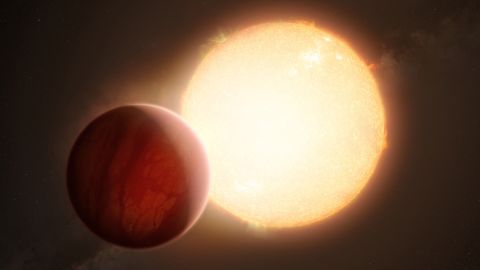 An artist's impression shows what an ultrahot exoplanet looks like just before it passes in front of its host star. As starlight passes through the gas giant's atmosphere, astronomers can spot specific elements.