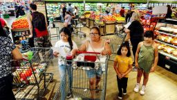 People shop for groceries during the grand opening of Stater Bros. Markets at the site of an old Kmart in Riverside, California, on Wednesday, Sept. 28, 2022.
