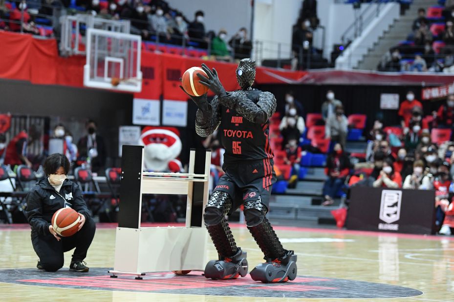 At nearly seven feet tall and weighing 240 pounds, <a href="https://edition.cnn.com/2022/10/12/sport/basketball-robot-cue-japan-hnk-spc-intl/index.html" target="_blank">CUE5 is a basketball-playing AI-powered robot.</a> It appeared at the Tokyo 2020 Olympics for a half-time demonstration, where it wowed spectators by shooting hoops from the half-court line.