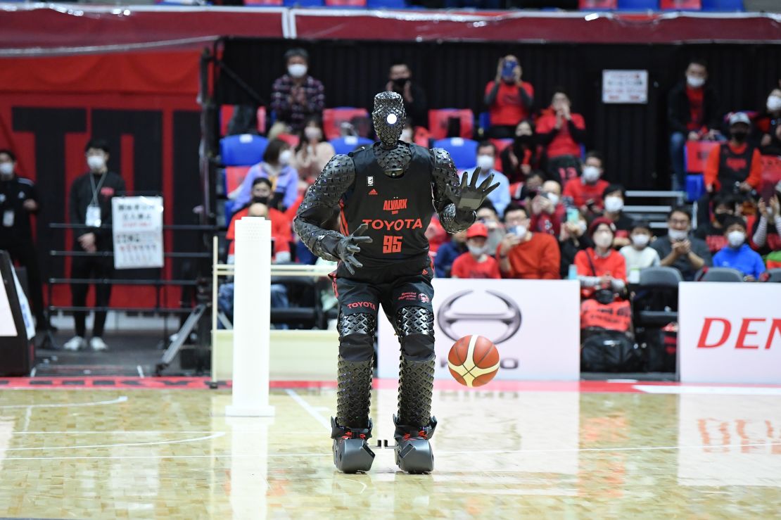 CUE5 (pictured) appeared at the Tokyo 2020 Olympics for a half-time demonstration of its skills, including dribbling the ball and shooting from the half-court line.