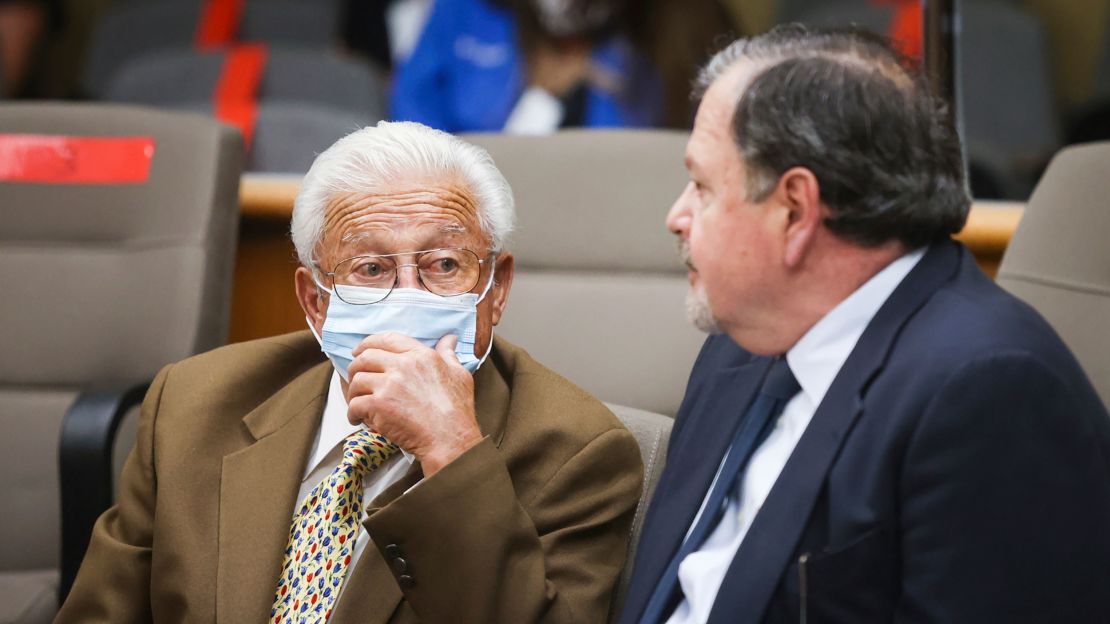 Ruben Flores, left, sits with his attorney Harold Mesick before a court hearing on July 14, 2021, in San Luis Obispo, California.