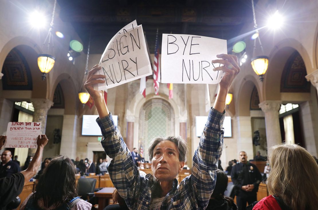 Genaro Leal joins community members in calling for the resignation of Nury Martinez, Kevin de Leon and Gil Cedillo at City Hall Council chambers in downtown Los Angeles on October 12, 2022. 