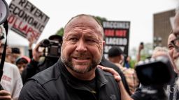 AUSTIN, TX - APRIL 18: Infowars founder Alex Jones interacts with supporters at the Texas State Capital building on April 18, 2020 in Austin, Texas. The protest was organized by Infowars host Owen Shroyer who is joining other protesters across the country in taking to the streets to call for the country to be opened up despite the risk of the COVID-19. (Photo by Sergio Flores/Getty Images)