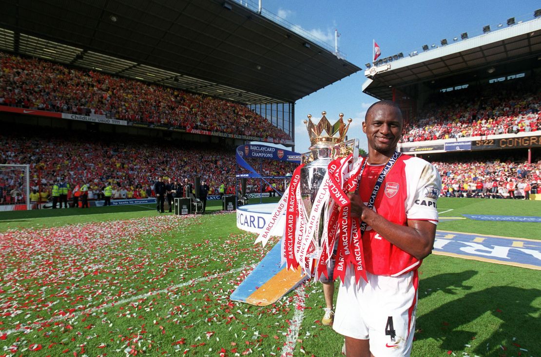 Patrick Vieira holds aloft the Premier League trophy after the Premier League match between Arsenal and Leicester City in 2004.
