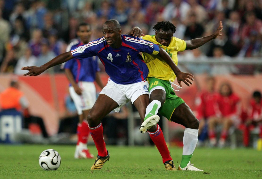 Vieira won the World Cup with France in 1998. He is pictured with Adekanmi Olufade of Togo battling for the ball at the World Cup in 2006.