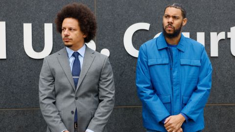 Actors and comedians Eric André, left, and Clayton English stand in front of the Richard B. Russell federal courthouse during a news conference in Atlanta on Tuesday.