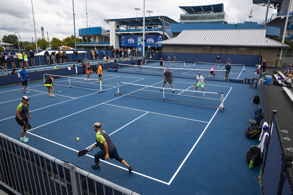 The basic aim of pickleball is to hit the ball over the net -- and stop an opponent from hitting it back.