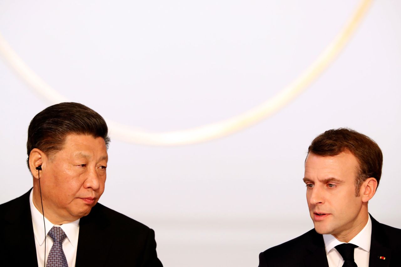 Xi and French President Emmanuel Macron hold a news conference in Paris in March 2019.
