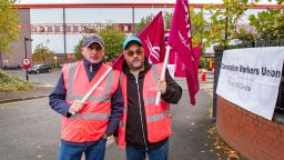 Royal Mail's workers at the main entrance of Wolverhampton Royal Mail Centre.
The CWU strike and picket line, Royal Mail-North West Midlands Mail Centre, Wolverhampton, United Kingdom - 13 Oct 2022. Photo by Gustavo Pantano/Spotlight Images/Shutterstock (13461935d)