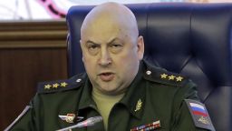FILE - Colonel General Sergei Surovikin, Commander of the Russian forces in Syria, speaks, with a map of Syria projected on the screen in the back, at a briefing in the Russian Defense Ministry in Moscow, Russia, Friday, June 9, 2017. Russia's Defense Ministry announced that air force chief, Gen. Sergei Surovikin, would be the commander of all Russian troops fighting in Ukraine. The statement marked the first official appointment of a single commander for the entire Russian force in Ukraine. (AP Photo/Pavel Golovkin, File)
