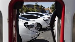 Tesla vehicles charging at a station in Chula Vista, CA on Aug. 25, 2022. 