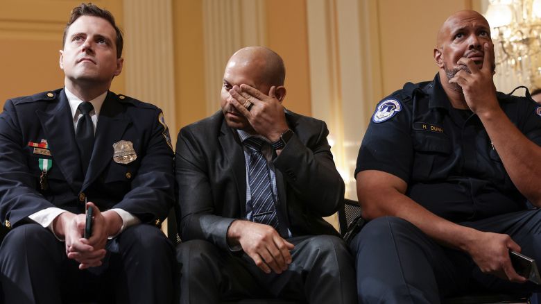 WASHINGTON, DC - OCTOBER 13: (L-R) Metropolitan Police Officer Daniel Hodges, U.S. Capitol Police Sergeant Aquilino Gonell, and U.S. Capitol Police officer Harry Dunn attend a hearing by the House Select Committee to Investigate the January 6th Attack on the U.S. Capitol in the Cannon House Office Building on October 13, 2022 in Washington, DC. The bipartisan committee, in possibly its final hearing, has been gathering evidence for almost a year related to the January 6 attack at the U.S. Capitol. On January 6, 2021, supporters of former President Donald Trump attacked the U.S. Capitol Building during an attempt to disrupt a congressional vote to confirm the electoral college win for President Joe Biden. (Photo by Alex Wong/Getty Images)