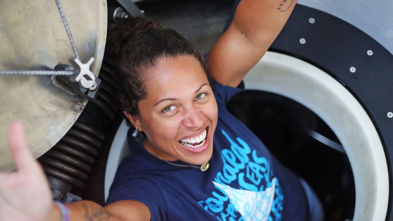 Sabrina Douglas emerges from Alvin after a dive. She became the first Cayman native to dive down to the Mid-Cayman Rise, part of the boundary between the North American and Caribbean tectonic plates.