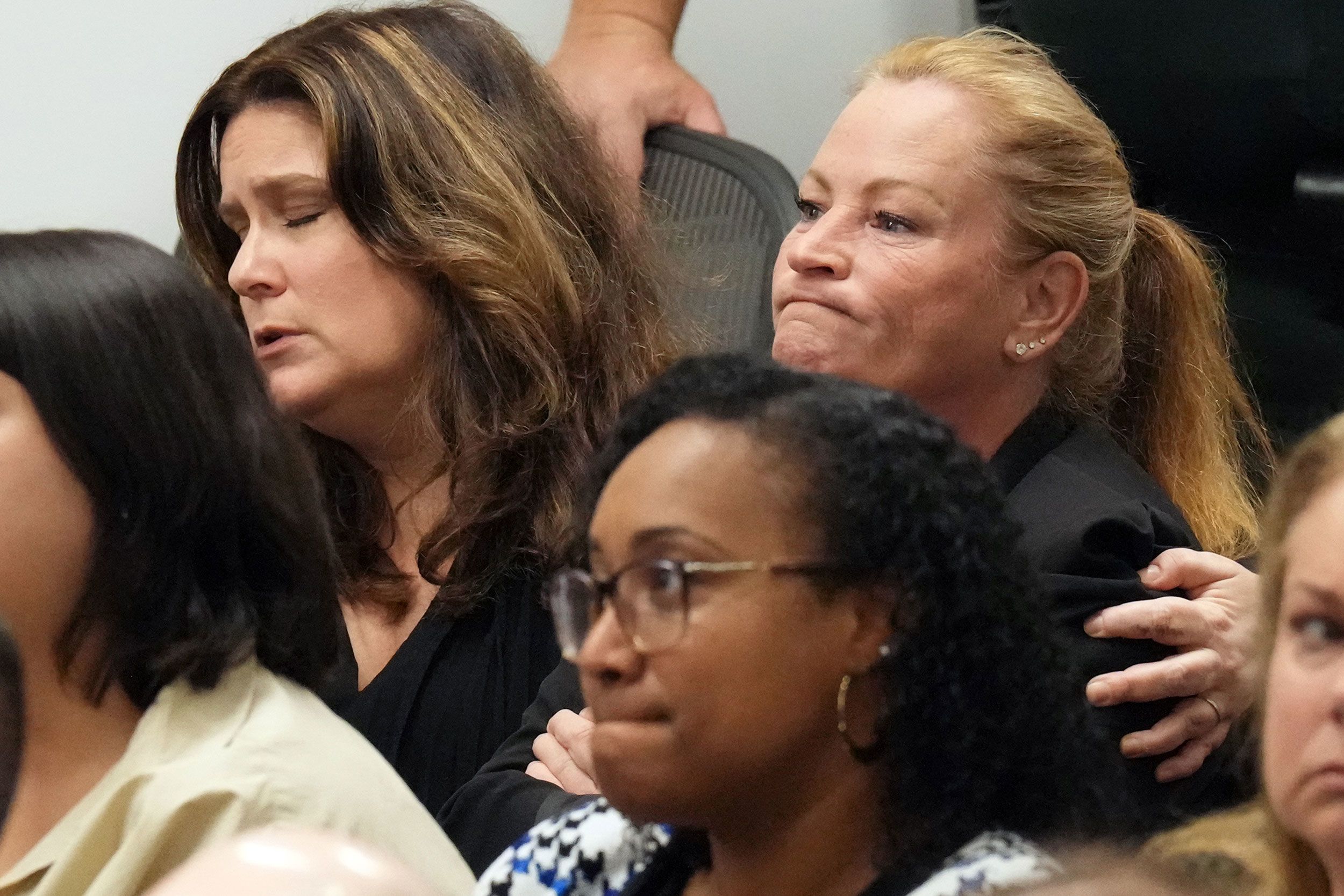 People react in a courtroom in Fort Lauderdale, Florida, as a jury's recommended sentence is announced in the trial of Nikolas Cruz on Thursday, October 13.