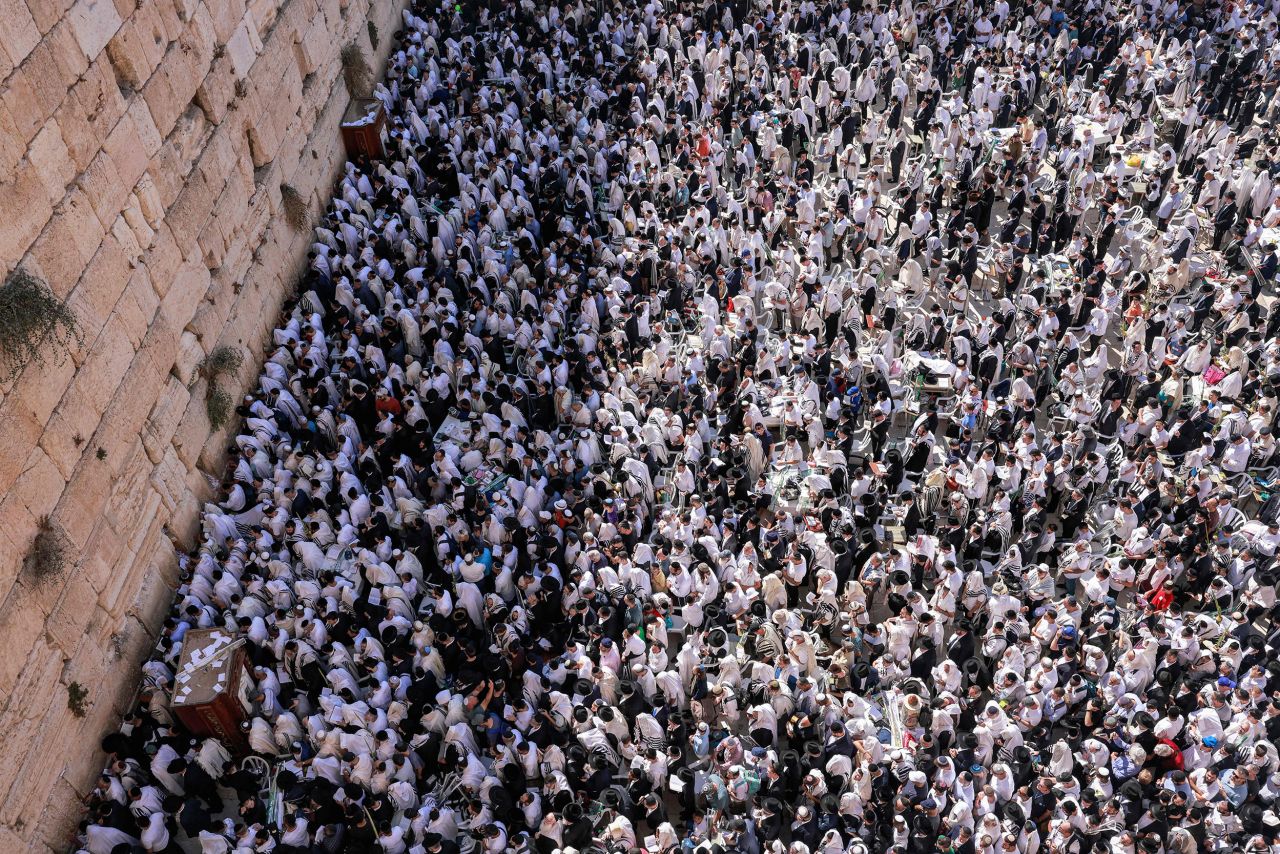 Jewish men gather at the Western Wall in Jerusalem to perform the annual Cohanim prayer during the holiday of Sukkot on Wednesday, October 12.
