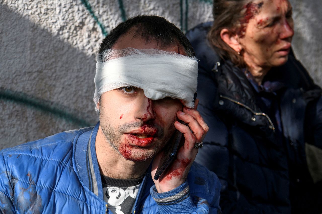 A man speaks on his cell phone after a <a href="https://www.cnn.com/2022/10/10/europe/ukraine-kyiv-missile-strikes-russia-intl" target="_blank">Russian missile strike</a> in Kyiv, Ukraine, on Monday, October 10.