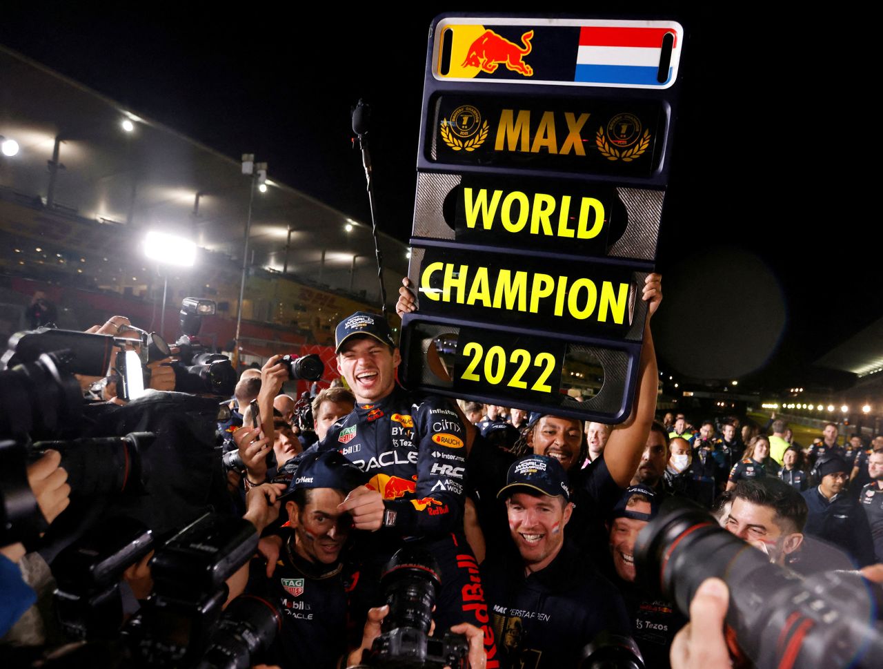 Formula One driver Max Verstappen celebrates with his team after winning the Japanese Grand Prix <a href=