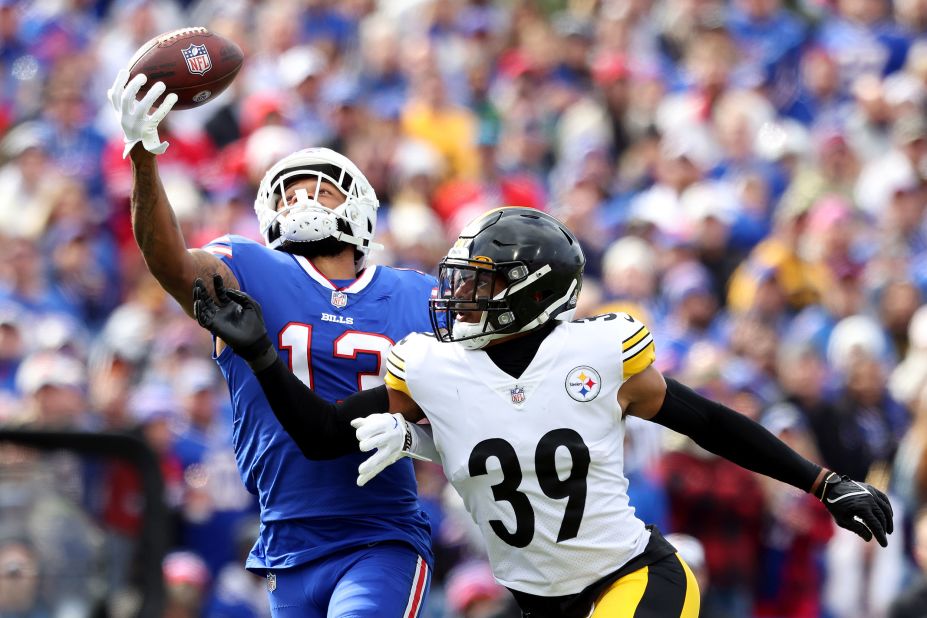 Gabe Davis of the Buffalo Bills makes a one-handed catch for a touchdown against Minkah Fitzpatrick of the Pittsburgh Steelers during the second quarter at Highmark Stadium. The Bills dominated the Steelers 38-3 with Davis scoring two touchdowns on the day.