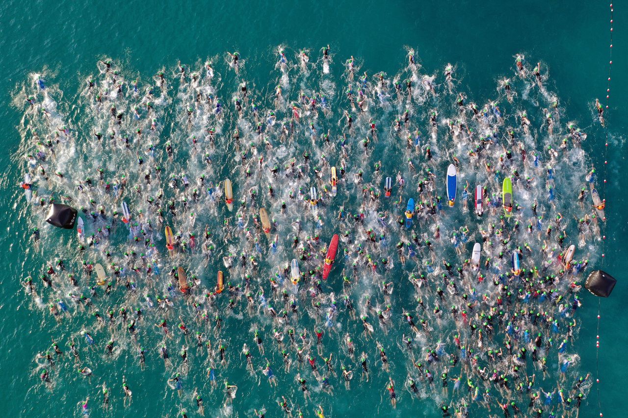 Athletes begin the swimming portion of the Ironman World Championship event Saturday, October 8, in Kailua Kona, Hawaii.