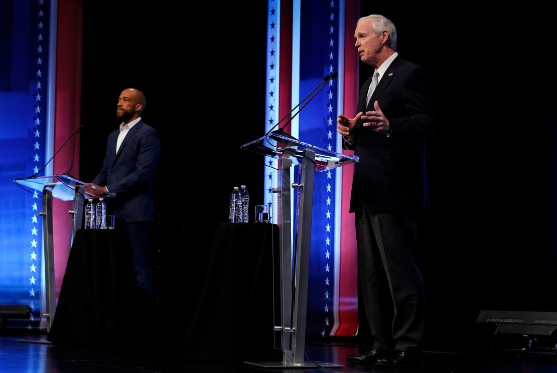 Lt. Gov. Mandela Barnes, left, and Sen. Ron Johnson debate on Thursday in Milwaukee. 