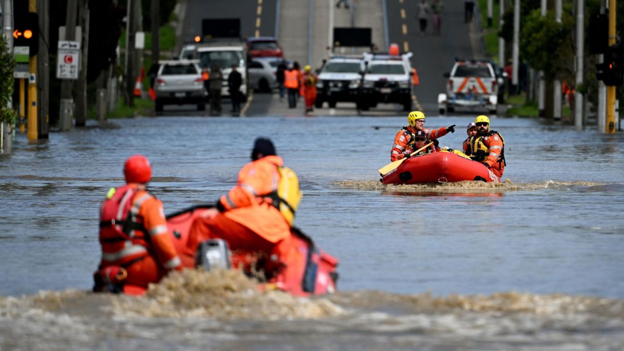 Emergency workers patrol a flooded area as they evacuate residents in the Melbourne suburb of Maribyrnong on October 14, 2022. 