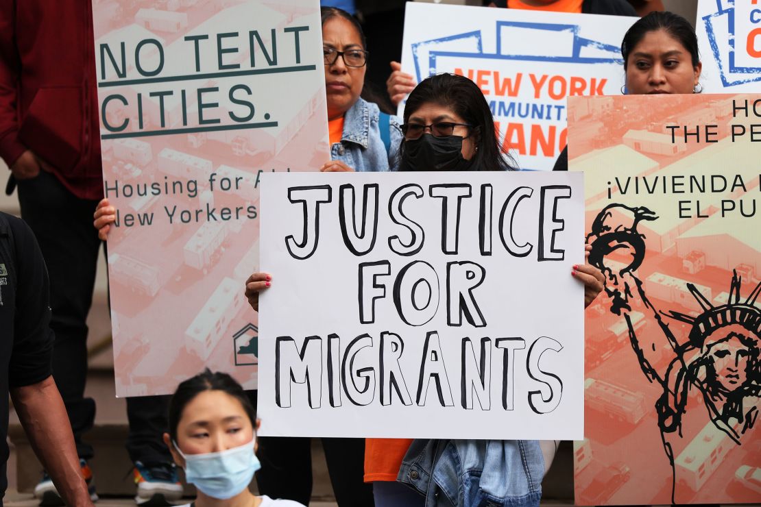 Protesters at New York's City Hall on October 13 call for eviction protections, measures to provide more affordable housing and safer alternative housing options for asylum seekers.