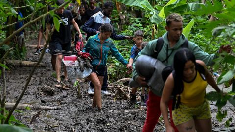 Venezuelan migrants arrive at Canaan Membrillo village, the first border control of the Darien Province in Panama, on October 13, 2022. 