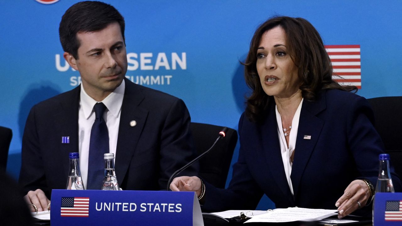 Transportation Secretary Pete Buttigieg, left, listens to Vice President Kamala Harris speak during the US-ASEAN Special Summit at the State Department in Washington, DC, on May 13, 2022. 