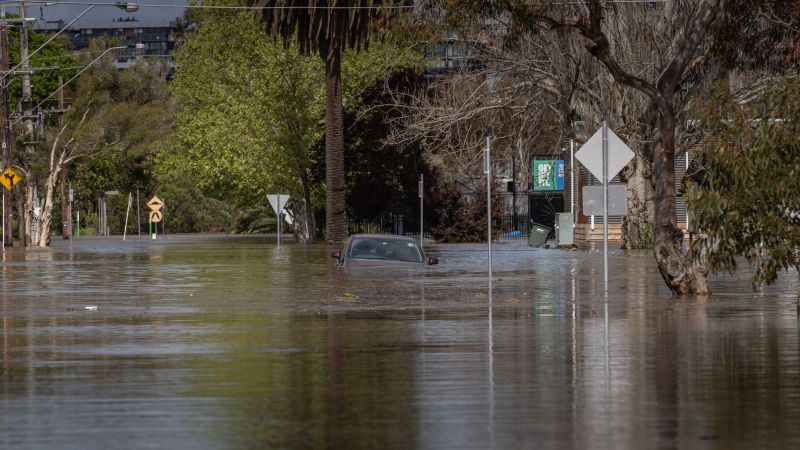 Man found dead in flooded backyard as Australia braces for more heavy rain | CNN