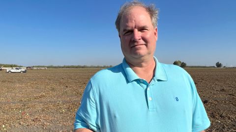 Mike Montna, president and CEO of the California Tomato Growers Association, stands on a farm nearing the end of its harvest for the season. 
